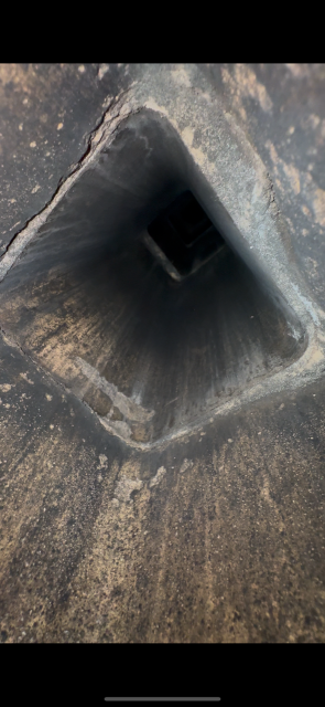 In Brookfield, CT, we encountered damage to the chimney due to sulphuric acid the boiler exhaust. Installed a properly sized stainless steel 2-ply liner to increase safety and longevity of the chimney.