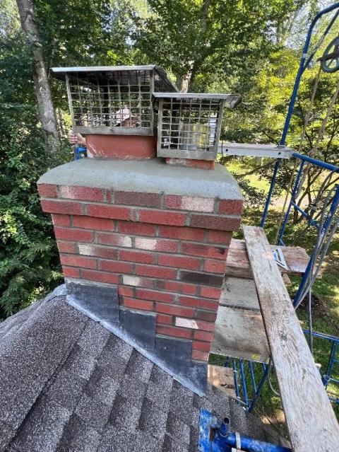 In Old Saybrook CT, We removed and rebuilt the chimney from the roof up due to extensive freeze/thaw damage and water intrusion. New flashing and crown were installed to ensure structural integrity and prevent future leaks.