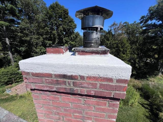 Some minor cracking in top crown and various mortar joints.  Small preventative maintenance repair.