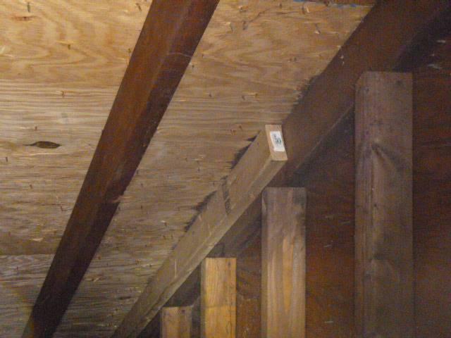 Meriden, CT, Chimney leak -  We found squirrels were actively chewing and gnawing holes through homeowner's Lead Flashing causing beginning stages of water damage in the attic area.  Replaced the counter flashing all the way around the chimney with brown stock coil.  Squirrel Proof !