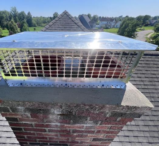Suffield Ct crown removal and replacement job. Installed a new stainless steel rain cap to protect the chimney from damaging New England weather.
