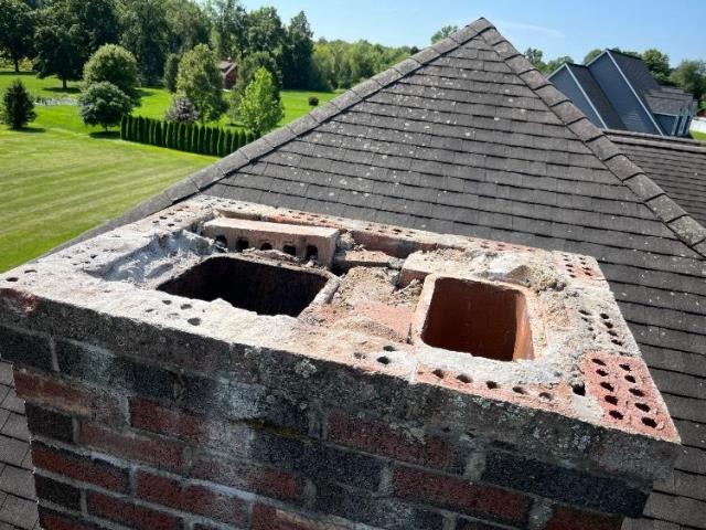 Suffield Ct crown removal and replacement job. Installed a new stainless steel rain cap to protect the chimney from damaging New England weather.