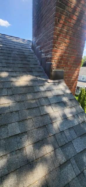 Chimney flashing in West Hartford CT was allowing leaks. Installed all new lead counter flashing.