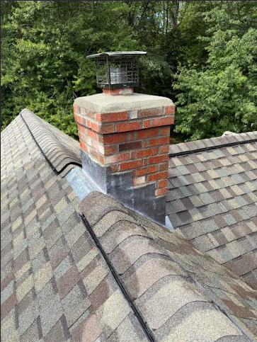 In Guilford CT, we rebuilt the chimney with all new materials, added a corbeled edge, and installed a new crown and flue tile. I also applied water repellent, installed a stainless-steel liner and cap, and finished with lead counter flashing. 