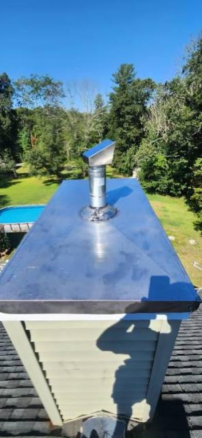 A chase pan in Killingly, CT, was rusted out and allowing water entry. Replaced the chase pan.