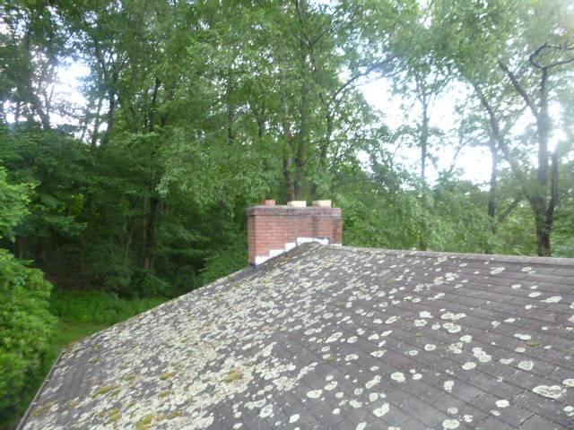In Manchester, CT, we installed a stainless steel liner system and clean-out door to address internal chimney deterioration and venting issues. We also rebuilt the chimney’s top section due to severe structural damage, ensuring proper sealing and long-term protection.
