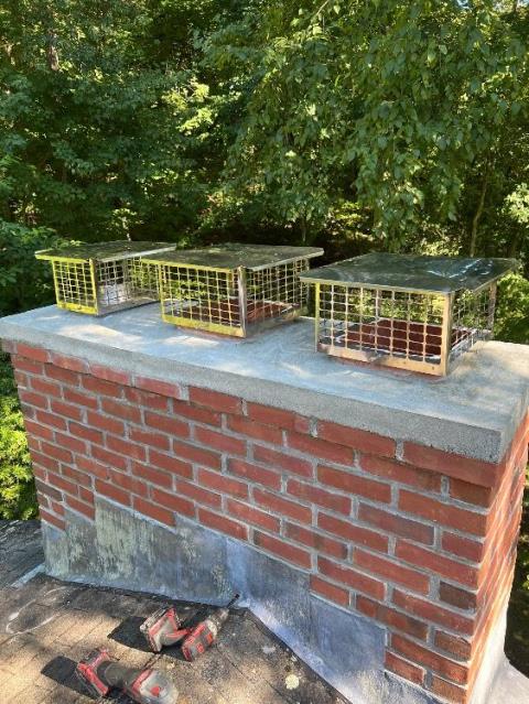 In Manchester, CT, we installed a stainless steel liner system and clean-out door to address internal chimney deterioration and venting issues. We also rebuilt the chimney’s top section due to severe structural damage, ensuring proper sealing and long-term protection.