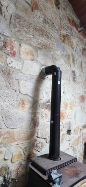 Woodstove liner installation in Hebron Ct and replaced the connector pipe.