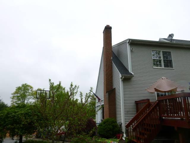 In Marlborough, CT, We installed a stainless steel liner to contain acidic exhaust from the high-efficiency boiler and protect the venting system. We also repaired crown, flue tile, and exterior fractures to prevent further structural damage and deterioration.