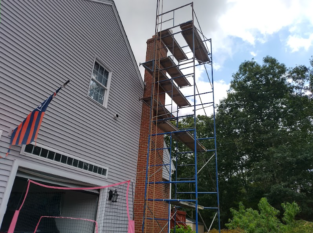 In Marlborough, CT, We installed a stainless steel liner to contain acidic exhaust from the high-efficiency boiler and protect the venting system. We also repaired crown, flue tile, and exterior fractures to prevent further structural damage and deterioration.