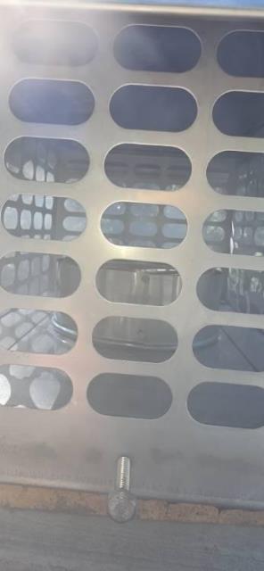 In West Hartford, CT, we installed a stainless-steel liner to properly vent exhaust from the high-efficiency furnace and water heater. A custom bracket was fabricated and installed to reattach the existing fireplace glass doors.