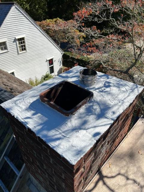 In Old Lyme CT, We installed a stainless steel smooth wall liner system to address interior flue condensation damage. This restored safe exhaust flow and protected the chimney from further deterioration.