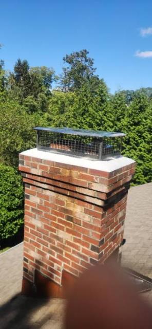 Chimney Repair In New Canaan CT, Installation of a chimney iiner system , due to offset in tile liner.   Perform Water prevention job of  Crown sealing the top masonry,  apply a commercial grade water repellent and install a 17x 31 cap. Chimney Repair In New Canaan CT, Installation of a chimney iiner system , due to offset in tile liner.   Perform Water prevention job of  Crown sealing the top masonry,  apply a commercial grade water repellent and install a 17x 31 cap.