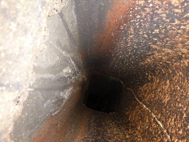 In Colchester, CT, we installed a properly sized stainless steel liner to safely vent acidic exhaust from the high-efficiency oil boiler. The damaged chimney top was also repaired to prevent further structural deterioration. In Colchester, CT, we installed a properly sized stainless steel liner to safely vent acidic exhaust from the high-efficiency oil boiler. The damaged chimney top was also repaired to prevent further structural deterioration.