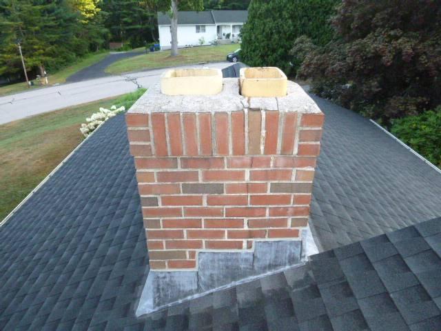 Waterford ct Chimney rebuild from roof up including new lead flashing and new crown.