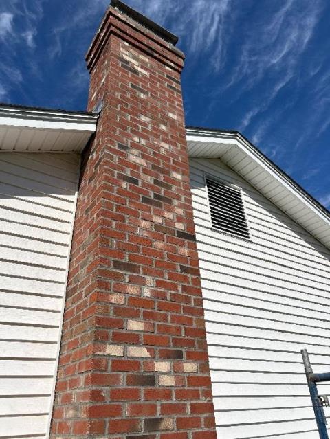 In Windsor, CT, we installed a properly sized stainless steel liner to safely vent exhaust and contain acidic moisture from the high-efficiency boiler. This corrected the venting issue and brought the system back within code to help protect the chimney structure.