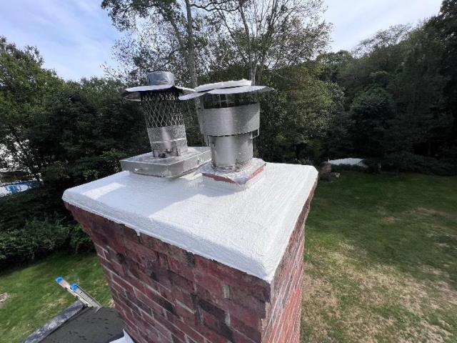 In Colchester, CT, we installed a stainless steel liner to contain acidic exhaust and protect the chimney’s internal structure. Minor exterior repairs and a stainless steel cap were also completed to prevent further damage.