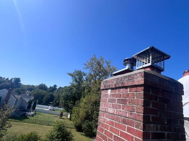 In Cheshire, CT, we completed chimney crown reconstruction and repointed damaged masonry to stop active water intrusion. 