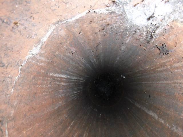 Just installed stainless steel liners in Bozrah, CT, for both wood stove chimneys to ensure safe, code-compliant venting of heat and embers. Rotted mortar joints and open flue gaps were corrected to prevent fire risk and further structural damage.