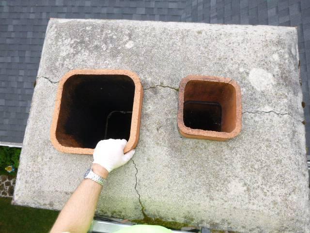 In Groton, CT, we installed a stainless steel liner system to safely vent acidic exhaust from the high-efficiency oil furnace. We also repaired the chimney crown, replaced damaged flue tiles, and installed stainless steel caps to protect both venting systems.