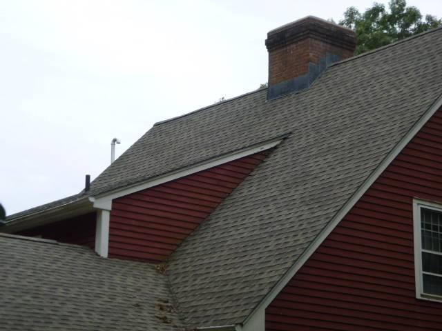 Installation of multi-flue rain cap in Tolland Ct to protect all three flues from new England weather.