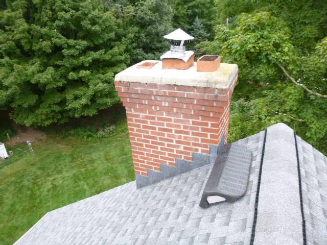 In Glastonbury, CT, we installed a stainless steel liner system and rebuilt the top crown and flue tile to correct venting issues and structural damage. Stainless steel caps were added to protect all flues and improve draft, ensuring long-term safety and performance.