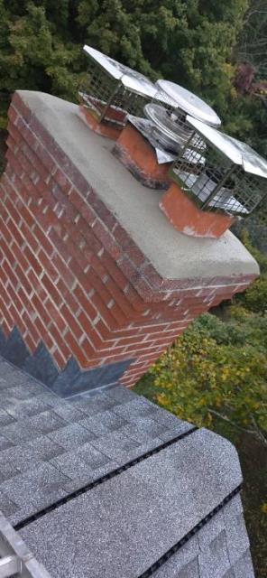 In Glastonbury, CT, we installed a stainless steel liner system and rebuilt the top crown and flue tile to correct venting issues and structural damage. Stainless steel caps were added to protect all flues and improve draft, ensuring long-term safety and performance.