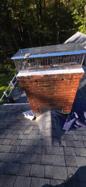 In Burlington, CT, we removed the deteriorated venting system and installed a stainless steel liner to properly exhaust acidic moisture.