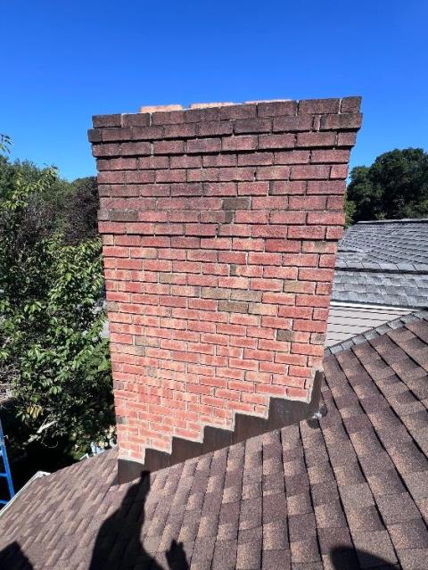 In Greenwich, CT, we removed the top courses of damaged brick and rebuilt the chimney using new severe weather brick. A new cement crown with a drip edge was constructed to improve durability and drainage.