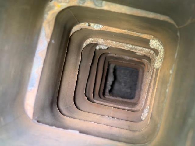 Severely shifted chimney flue tiles in Vernon ct restored with proper venting via a stainless steel flue installation , chimney rebuild recommended in future. 