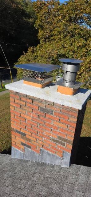 We found a cracked flue tile Enfield Ct liner, with deteriorated and broken mortar joints. Installed a gas tight venting system for safety.