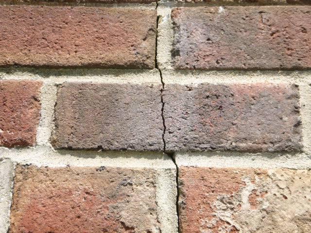 In East Granby, CT, we rebuilt the top ten courses of brick, flue tiles, and crown due to structural damage.