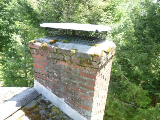 What a difference! The old Middletown Ct chimney was covered in moss and starting to fail — we rebuilt it with fresh brickwork, a solid new crown, and a stainless steel cap for long-term protection.
