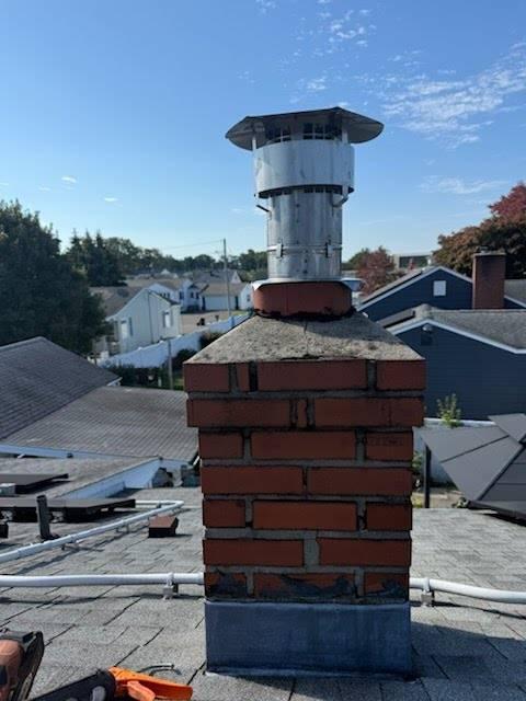 In East Haven, CT, installed a UL Listed stainless steel chimney liner system to address internal flue deterioration from condensation damage. This restored proper venting and protected the chimney from further harm.