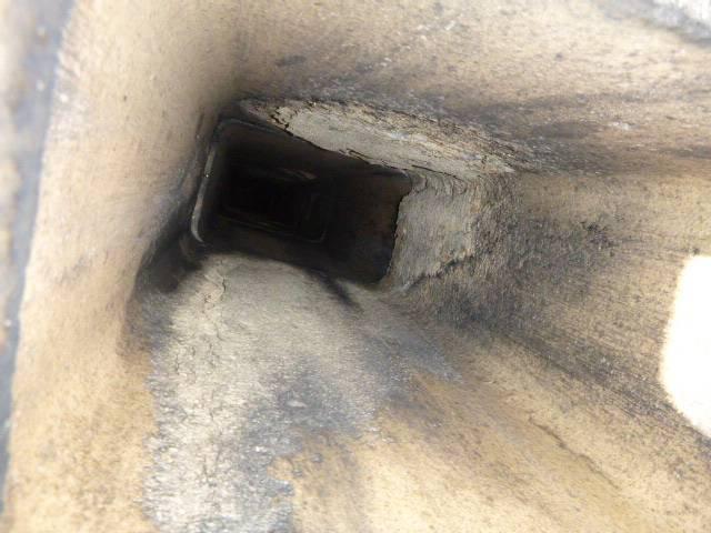 In West Hartford, CT, we installed a stainless steel two-ply smooth wall liner system to properly vent the high-efficiency furnace and water heater. We also removed a bracket from the fireplace glass door for fabrication and later reinstalled both doors with the new part.