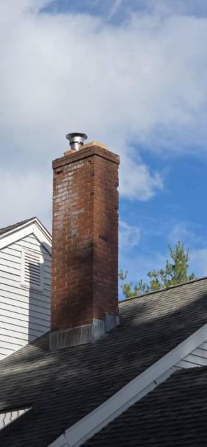 In Cheshire, CT, we installed a stainless steel chimney liner system to address interior flue damage caused by condensation. A new stainless steel cap was also installed to prevent future moisture intrusion.