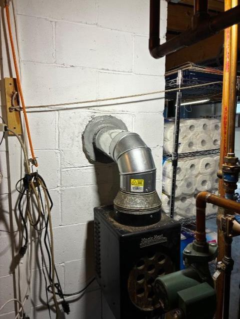 In Suffield, CT, we replaced the deteriorated chimney crown and installed a new stainless steel liner system to restore safe venting. These repairs addressed severe condensation damage and structural degradation within the flue.