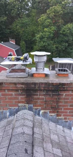A deteriorated and partially unlined Manchester ct chimney updated with new venting system.