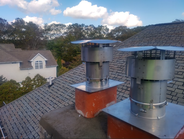 In Shelton CT We installed a properly sized stainless steel two-ply smooth wall liner to ensure safe venting and protect the chimney structure. We reconstructed the chimney crown, repointed open joints, and installed a stainless steel cap to prevent further damage.