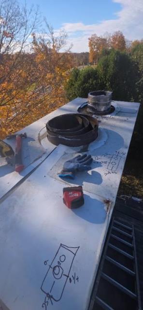 In Vernon, CT, We removed the damaged chase pan, storm collars, and caps that had failed from acid corrosion. We installed custom stainless steel components to fully protect the chimney structure from future water entry.