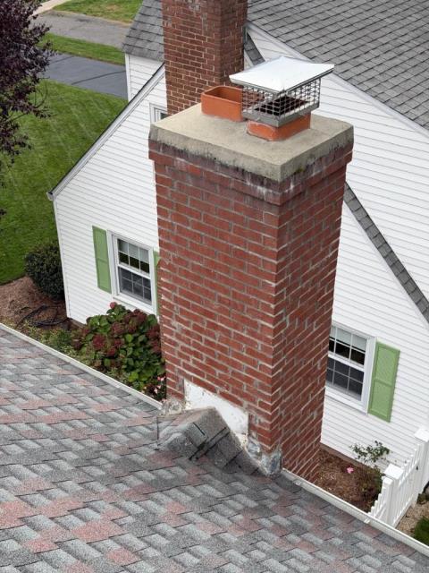 In Wethersfield, CT, We repaired the chimney crown with a flexible membrane and installed new lead flashing for lasting protection. A stainless steel multi-flue cap and water repellent were also applied for durability and weather resistance.
