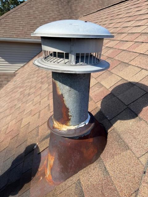 In East Haven, CT, We installed stainless steel pipe and caps and replaced all termination caps with stainless steel units to resolve rusted chimney issue.  We also installed new flashing boots and storm collars, ensuring all components were secure and ready for upcoming roof work.