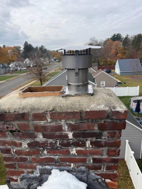 In East Hartford, we installed a new stainless steel chimney liner system to replace the damaged interior flue. This restoration ensured safe and efficient venting of combustion gases.