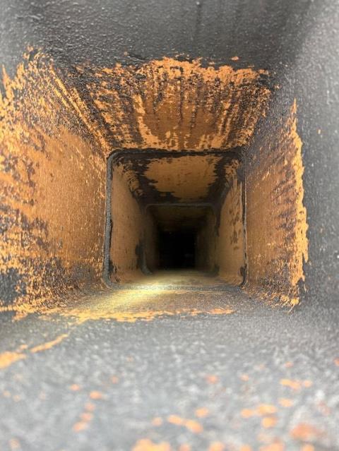 In Oakdale CT We removed the stage-three creosote glazing with a high-powered drill and wire whips. We cleaned the tiles and chamber.