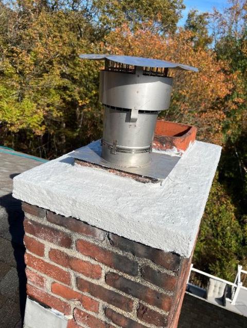 In Tolland, CT, we installed a UL-listed stainless steel chimney liner system to address interior flue damage caused by condensation. This restored safe venting of combustion by-products and protected the chimney structure from further deterioration.