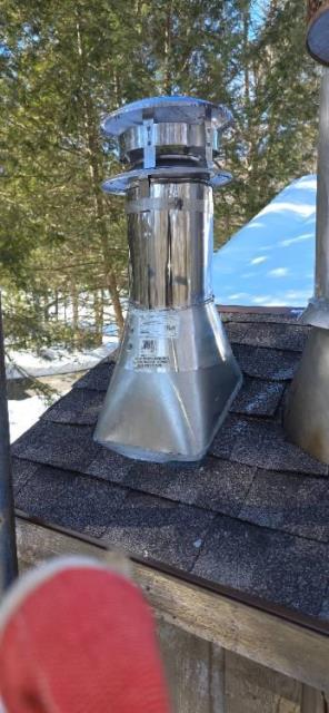 Replacing the oil furnace stack with a 6" Class A double wall insulated chimney pipe, sleeving remaining stacks, updating caps, flashing, shingles, ice-and-water, and rake edges.