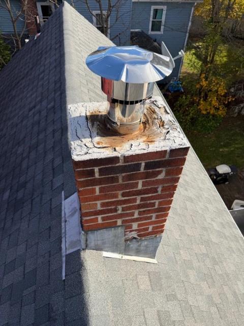 In Manchester CT, We removed the damaged chimney exterior and rebuilt it from the roof up with new brick and mortar. We installed new lead flashing and ensured long-term structural protection.