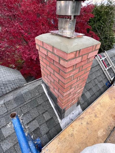 In Manchester CT, We removed the damaged chimney exterior and rebuilt it from the roof up with new brick and mortar. We installed new lead flashing and ensured long-term structural protection.