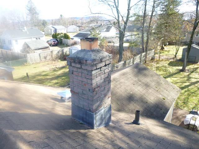 In Plantsville CT We installed a properly sized stainless steel liner to stop acidic moisture damage and restore safe venting. We then rebuilt the chimney’s upper structure to correct severe deterioration and protect it from future harm.