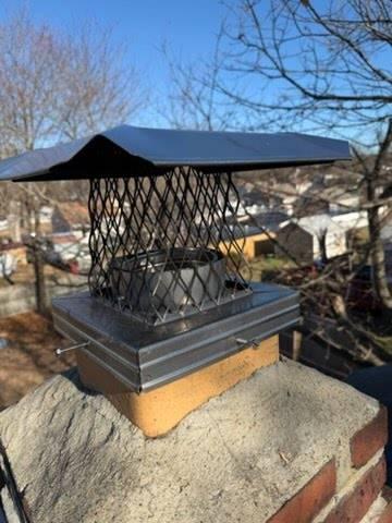 In East Hartford CT We found acidic condensation damage and deteriorated joints between flue tiles in the oversized chimney. We installed a properly sized stainless steel liner.